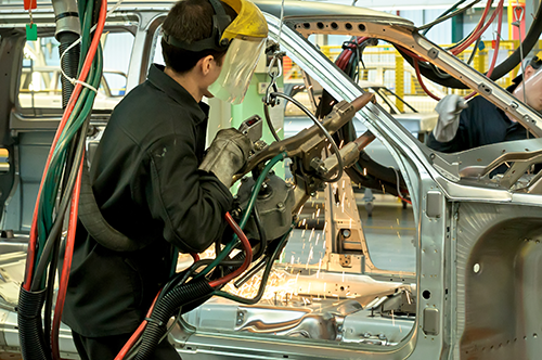 welder welding on automobile